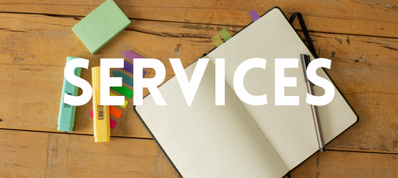 Writing utensils, a notebook and pen, on a desk with the word "services" in bold accross the image.